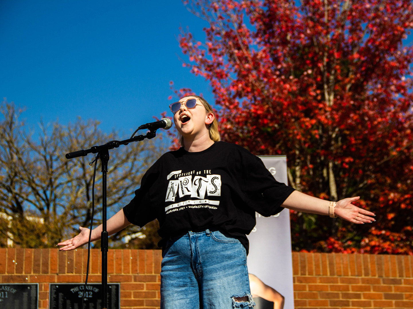 A UGA student sings at Student Spotlight 2023. (Mike Wooten, UGA Office of the Provost)
